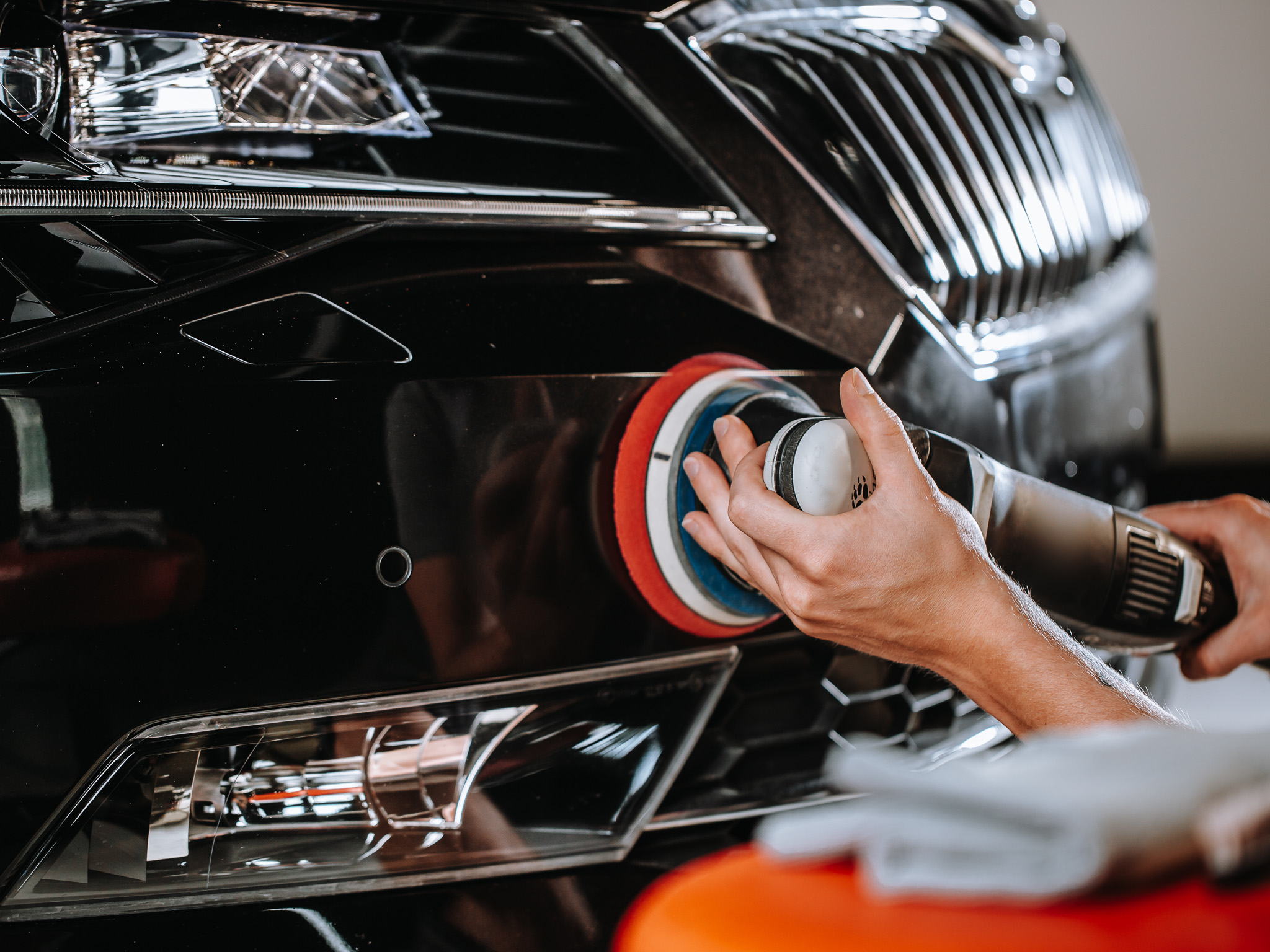 Professional detailing of a modern car, varnish polishing lacquer, cleaning car