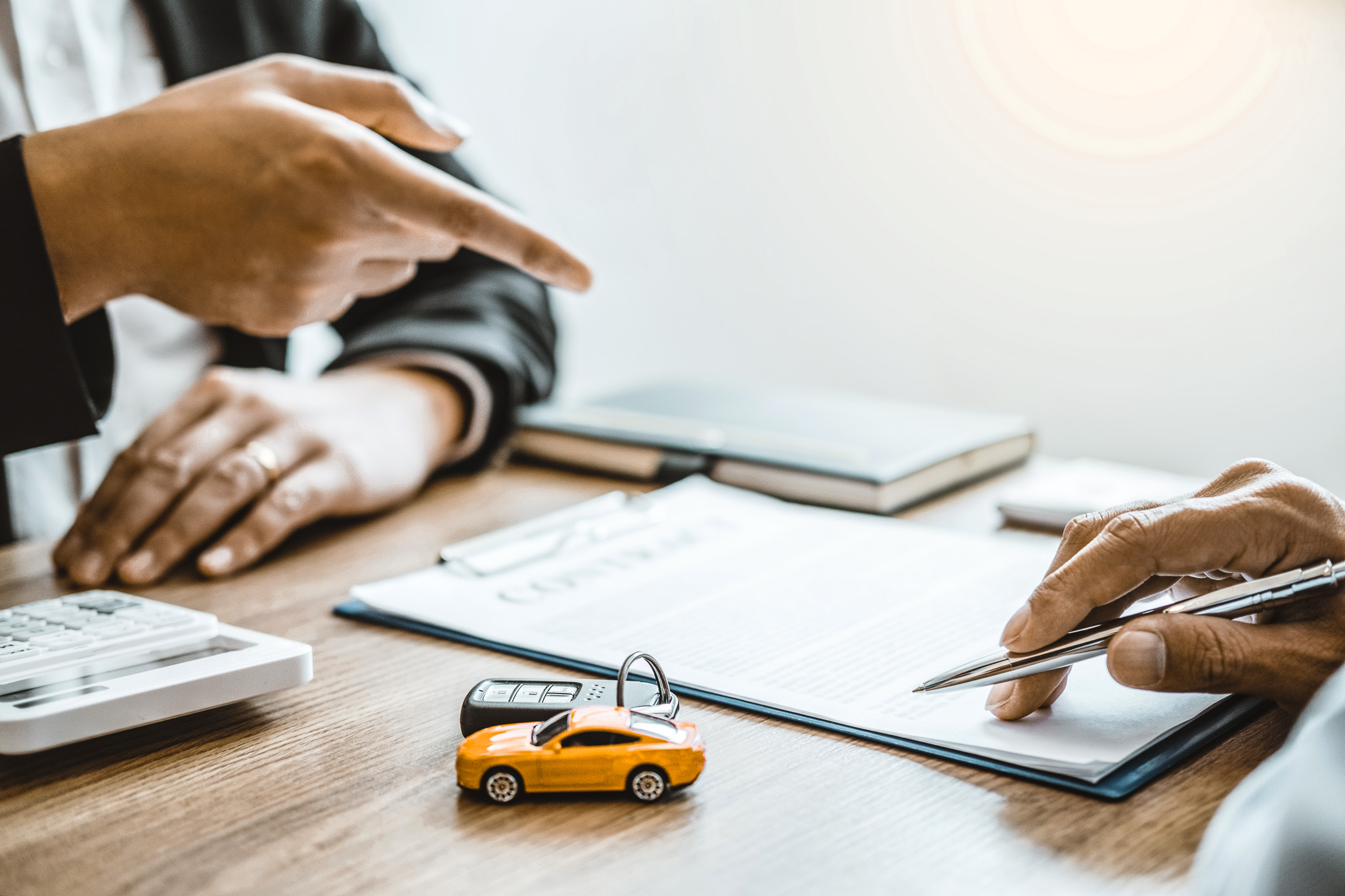 Sale agent  deal to agreement successful car loan contract with